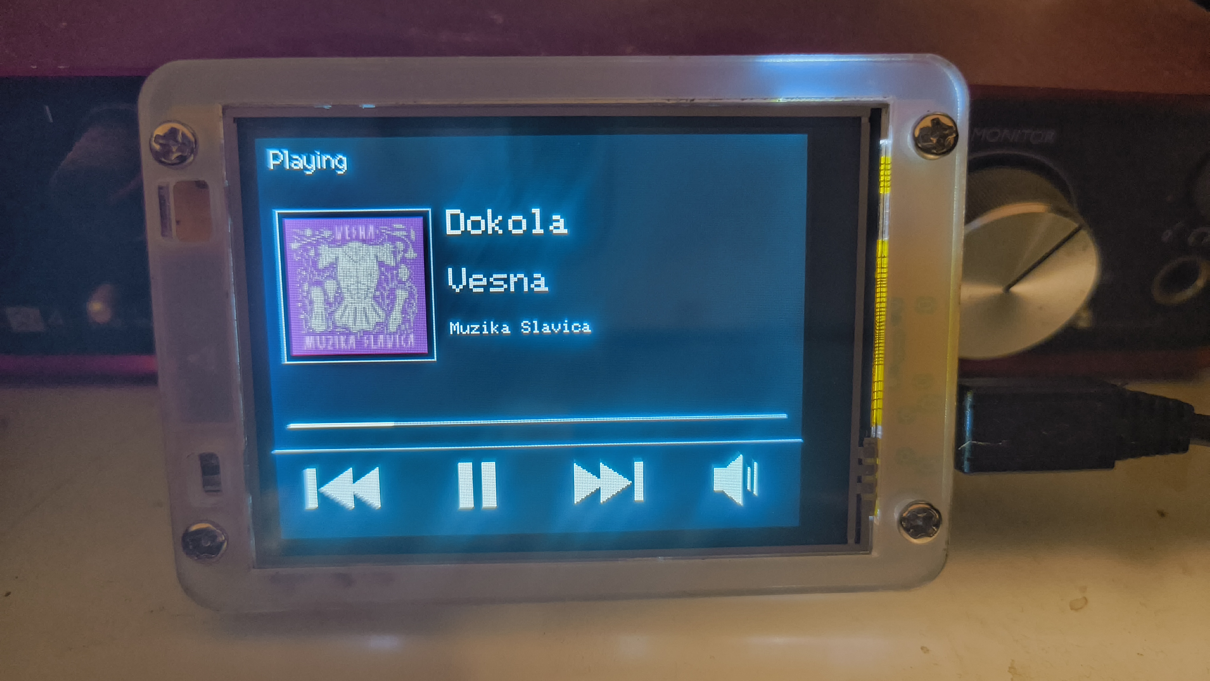 CYD Home Assistant Media Remote showing Spotify playback